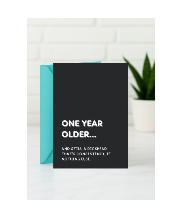 Birthday card about being one year older with a very direct insult card design